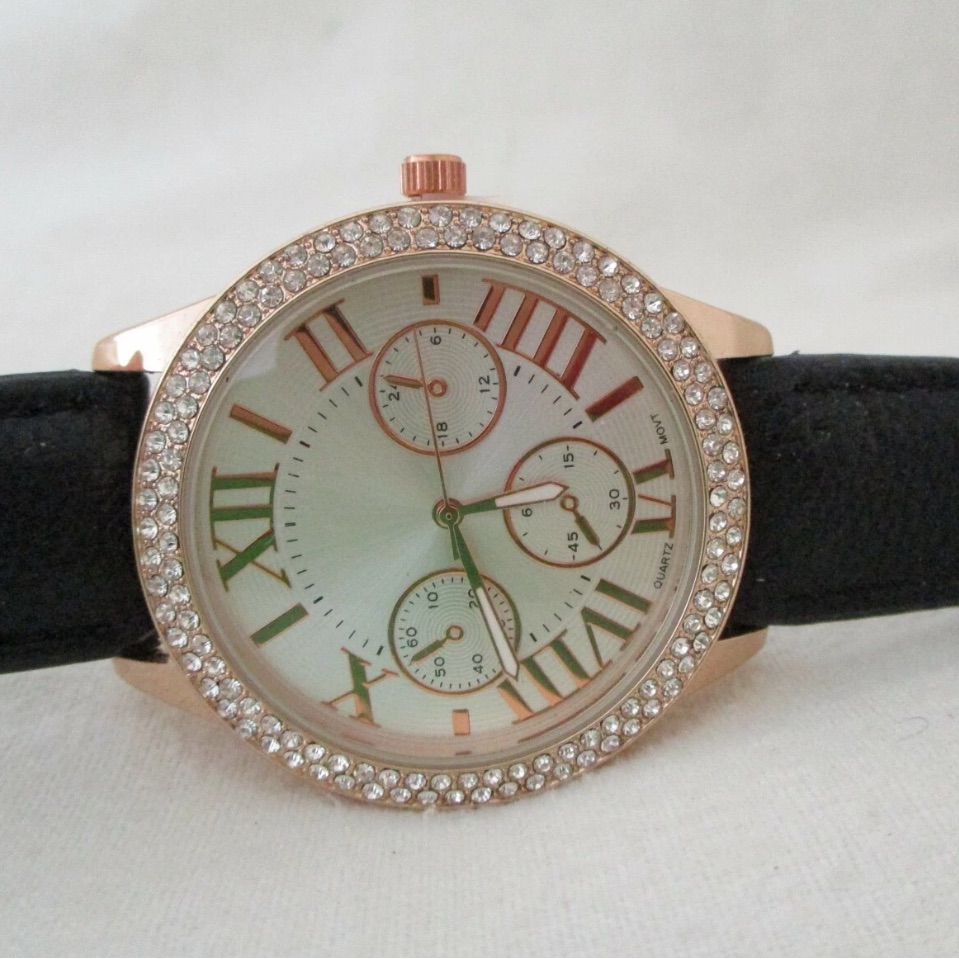 Elegant Rose Gold And Black Womens Watch